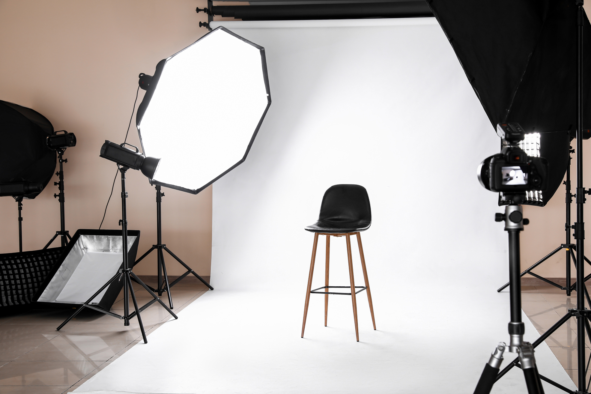 Chair and Equipment in Modern Photo Studio